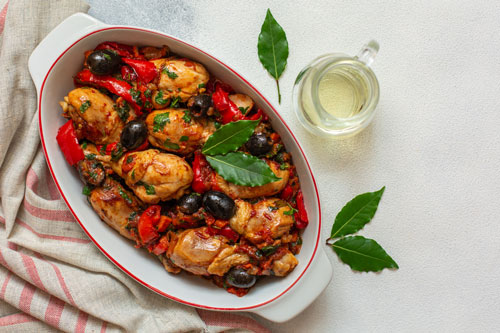 image of chicken thighs with red pepper and olives
