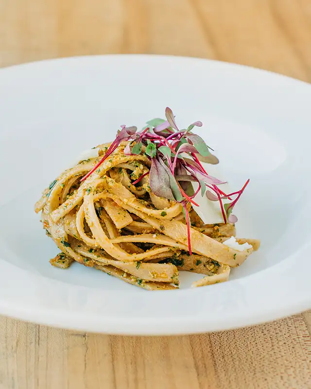 Pasta with nettle pesto and micro greens