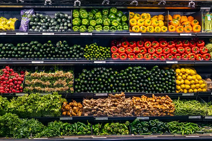 A wide view of produce on the shelves.