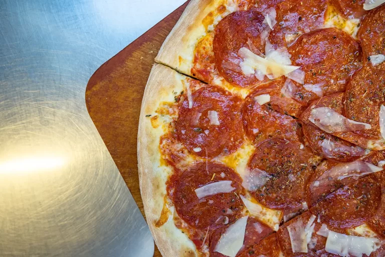 A close up of pepperoni pizza.