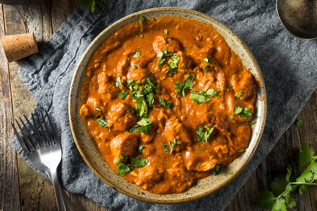 Homemade Chicken Tikka Masala with Cilantro and Sauce