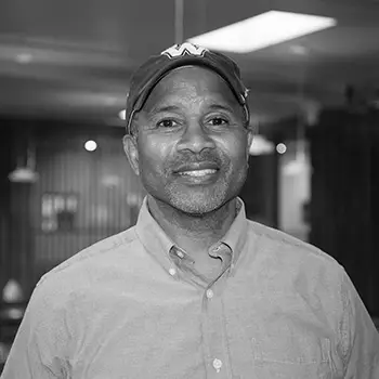 A black and white portrait of Board member, Arnie Sowell.