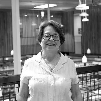 A black and white portrait of Board member, Barbara Mendenhall.