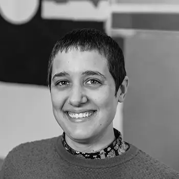 A black and white portrait of board member Bernadette.